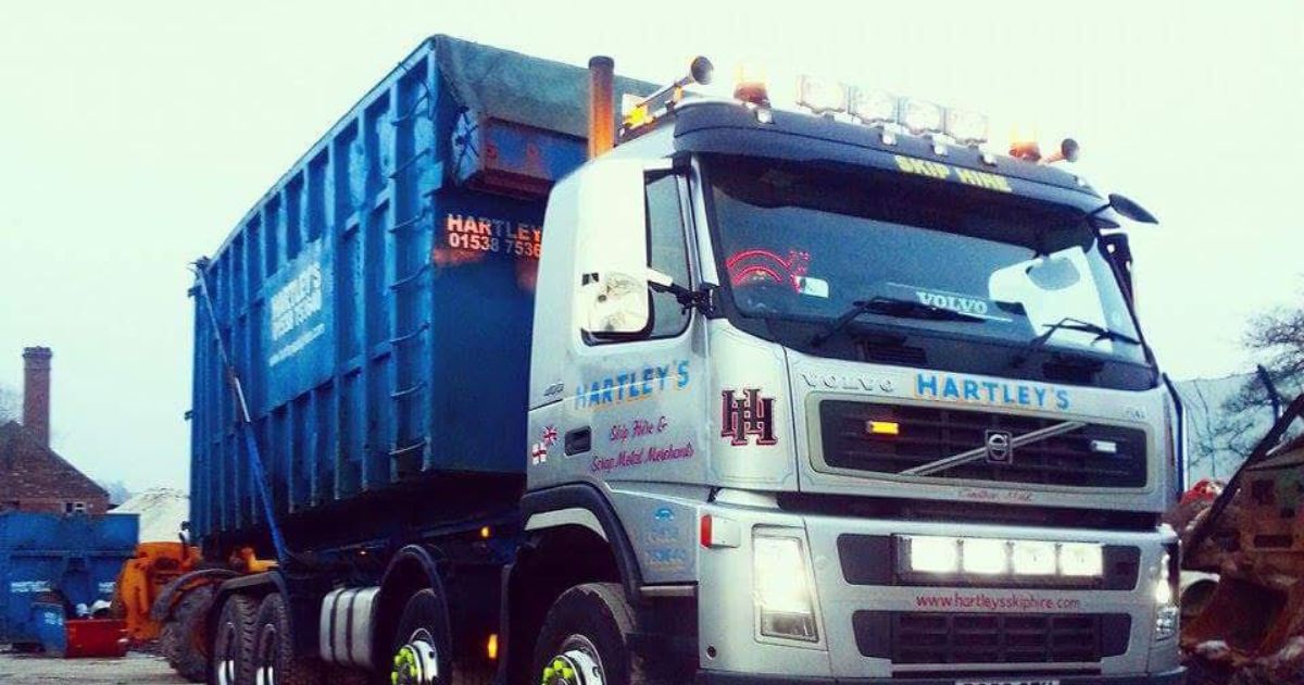 Commercial Waste Disposal Hartley’s Volvo skip lorry with blue container