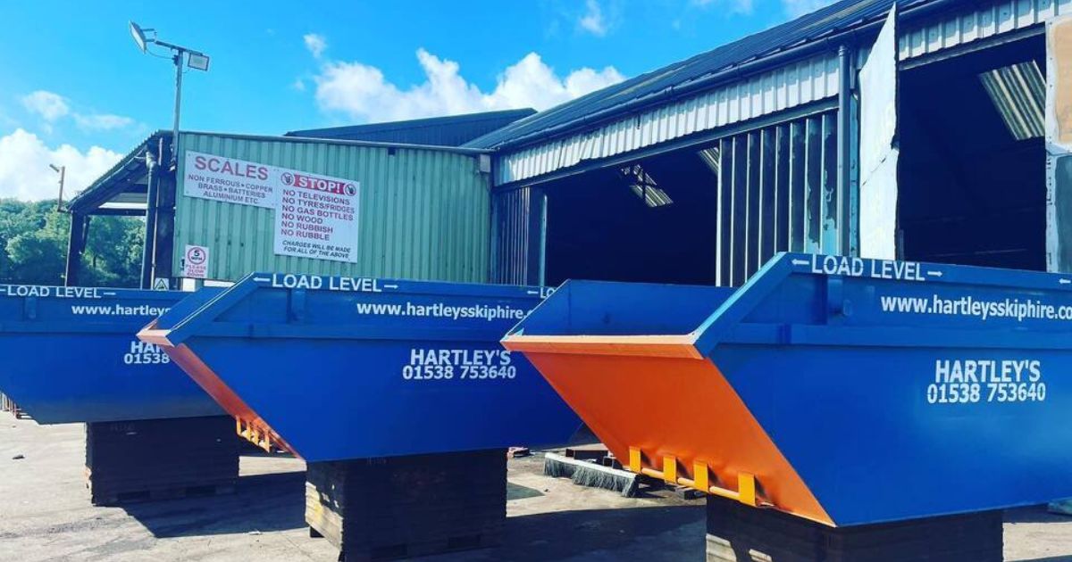 New skips for hire Hartley’s blue and orange skips available for hire in Stoke-on-Trent and Staffordshire, lined up outside the skip hire yard.