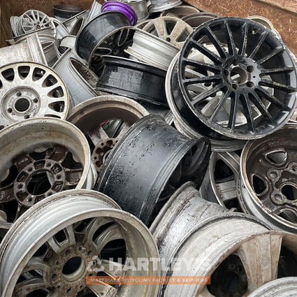 Scrap Alloy Wheels without tyres ready to be recycled in a scrap yard